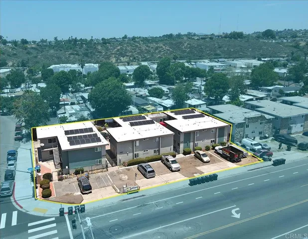 an outdoor space with lots of trees