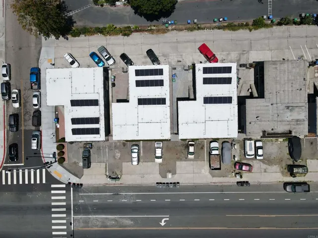 a aerial view of multi story residential apartment building