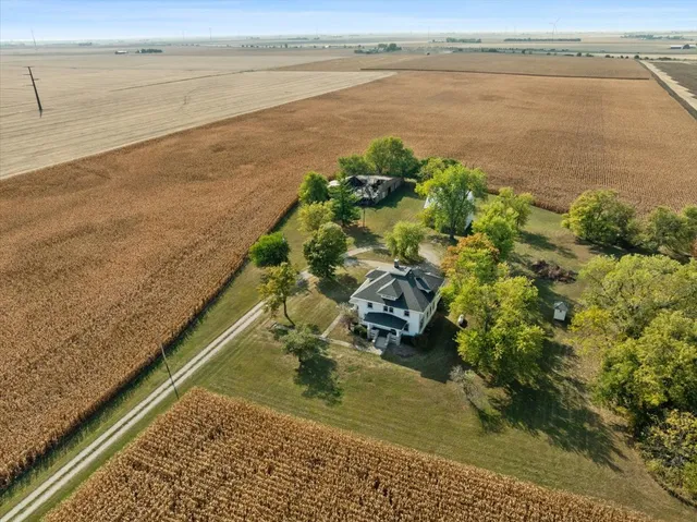 a picture of a bench in a white wall