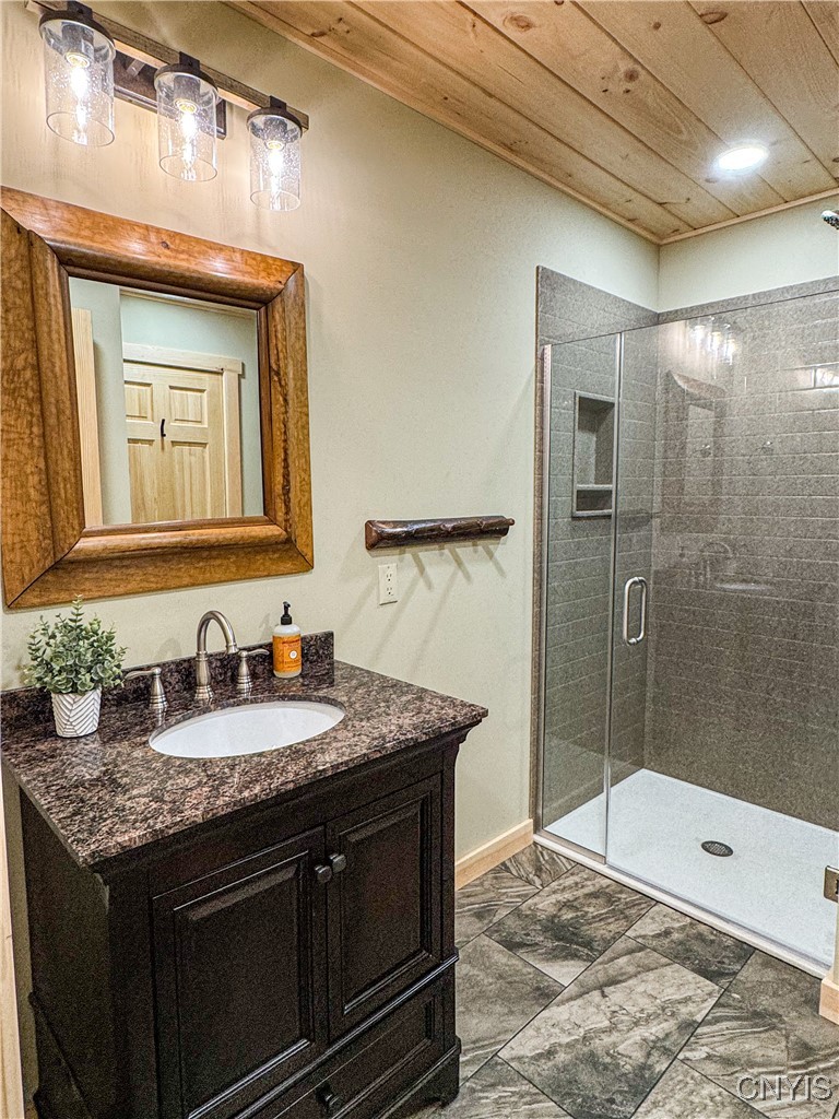 63 Rocky Point Circle Inlet, NY 13360 - Photo 14 of 38 First Floor Full Bathroom - Completed Model Shown