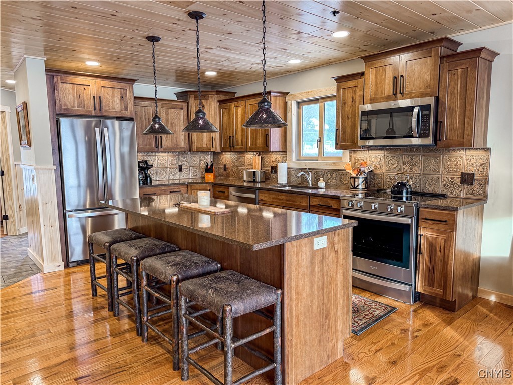 63 Rocky Point Circle Inlet, NY 13360 - Photo 6 of 38 Custom Kitchen - Completed Model Shown