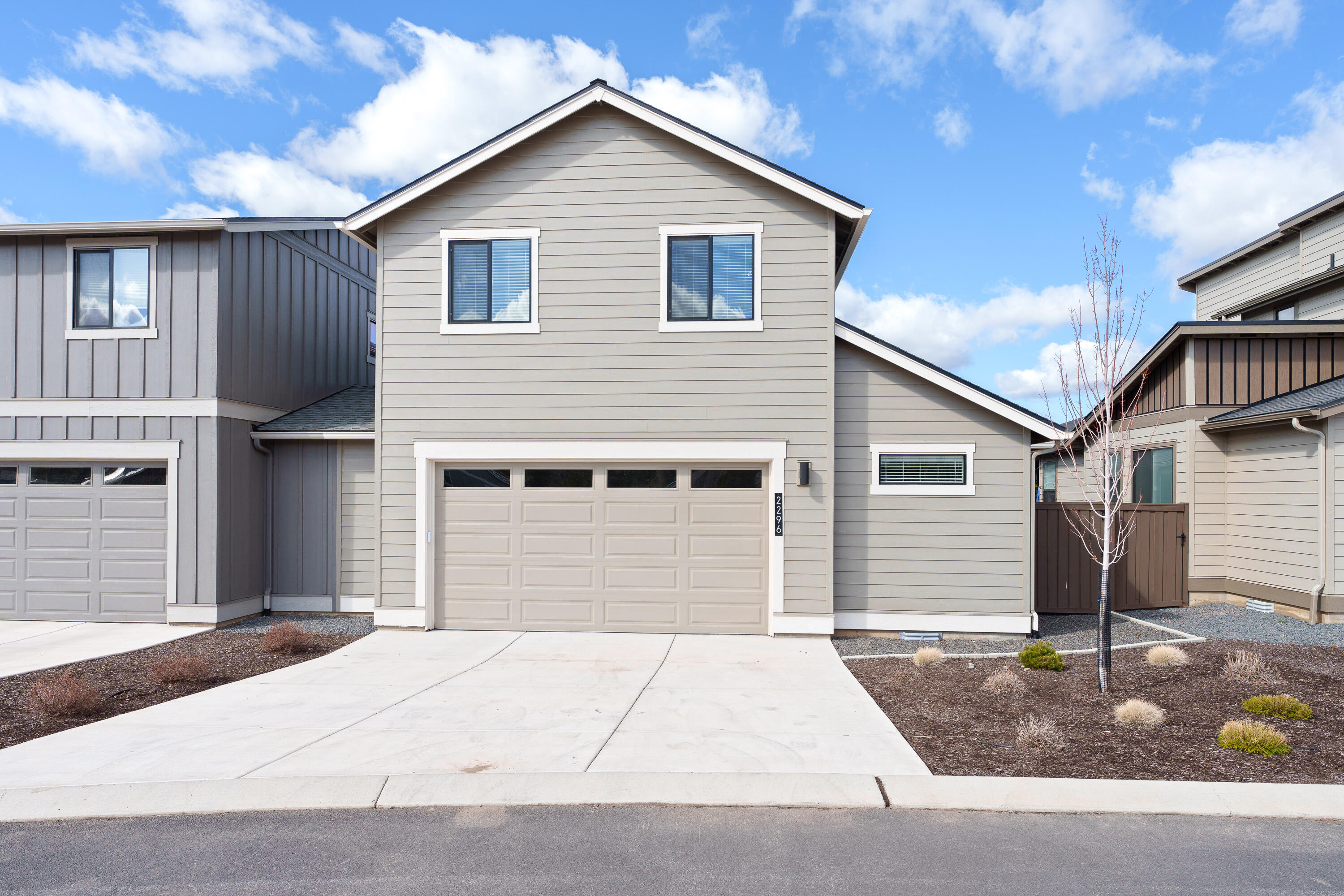 2296 Northwest Skyline Ranch Road Bend, OR 97703 - Photo 33 of 36 Driveway behind garage is large enough for 2 extra vehicles