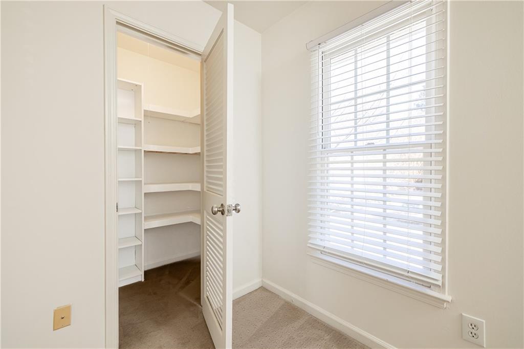1101 Collier Road Northwest, Unit I3 Atlanta, GA 30318 - Photo 20 of 24 a view of a room with a window and a hallway