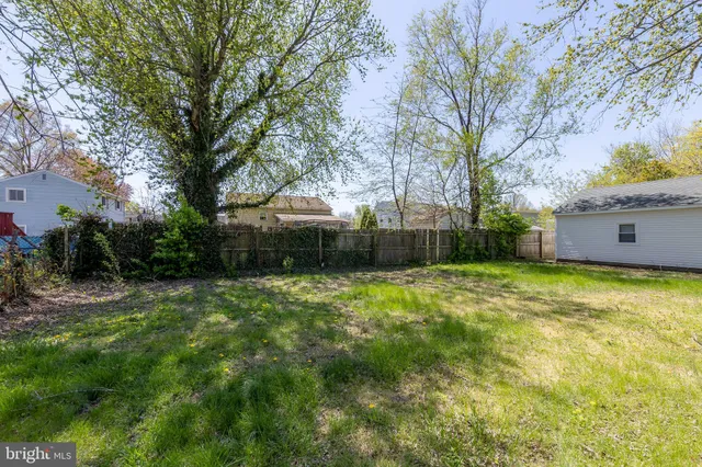 a fire hydrant in the middle of a field