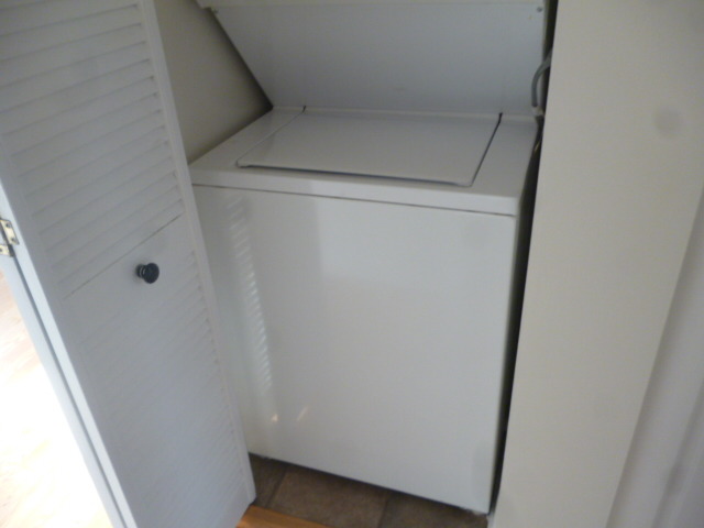 7530 North Ridge Boulevard, Unit 3W Chicago, IL 60645 - Photo 21 of 23 a close up view of washer and dryer