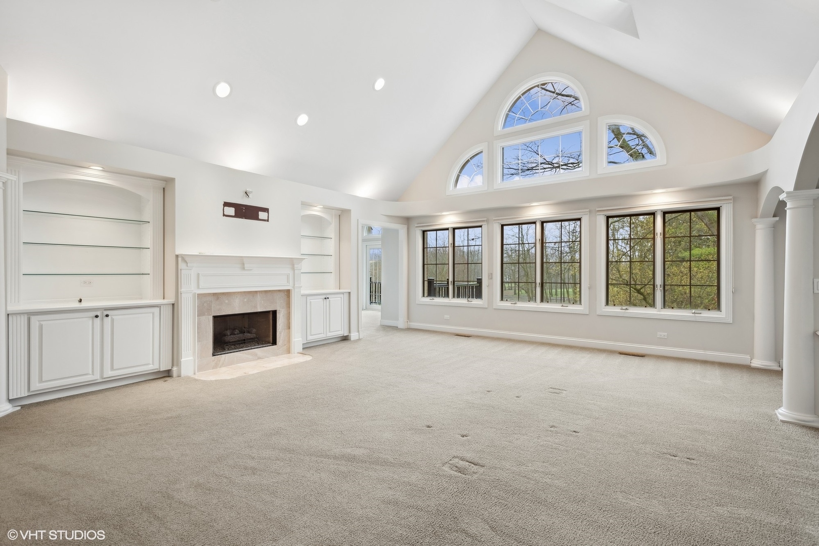 5N156 Dunham Road St. Charles, IL 60174 - Photo 47 of 65 a view of an empty room with a fireplace and a window