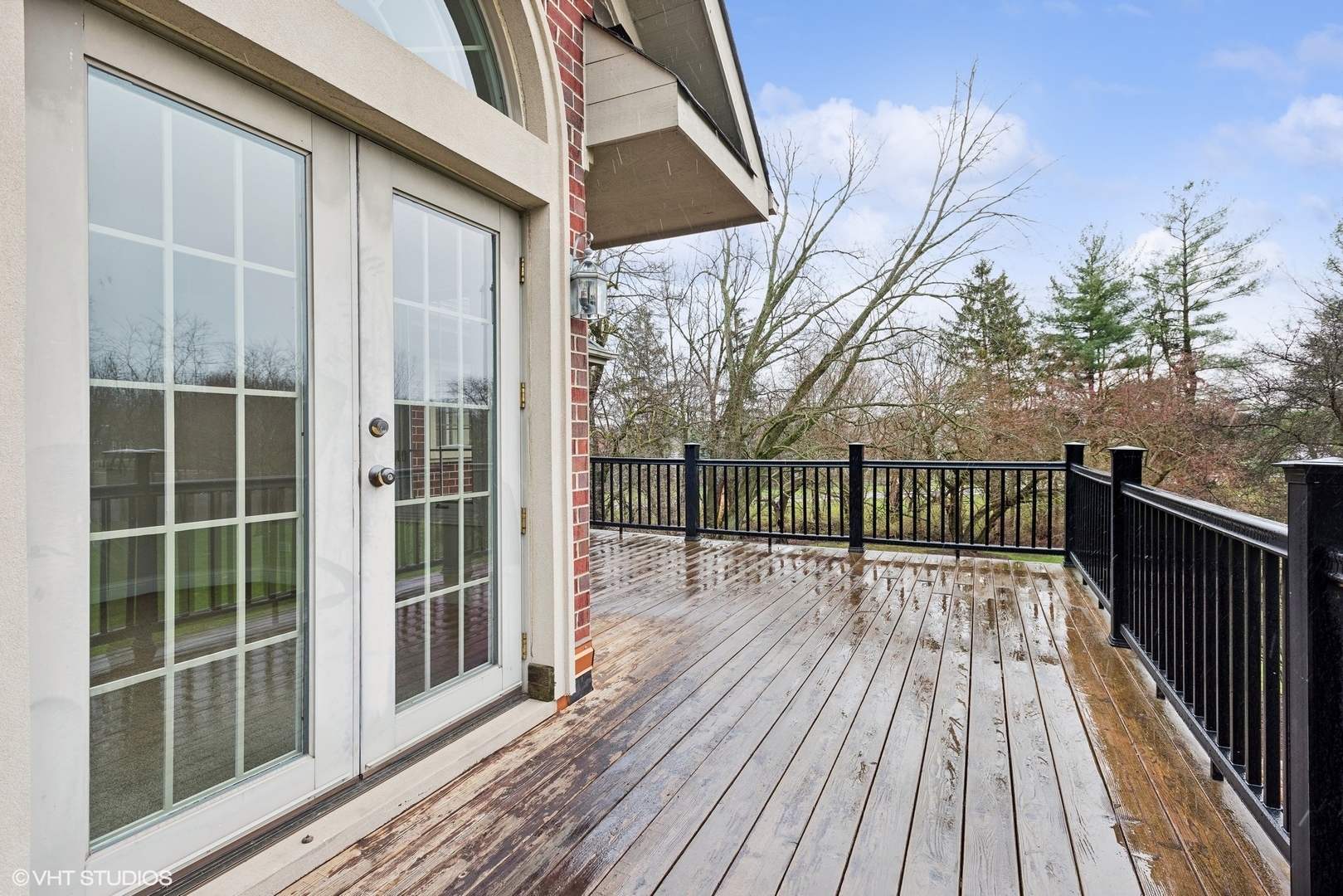 5N156 Dunham Road St. Charles, IL 60174 - Photo 50 of 65 a view of balcony with wooden floor and fence