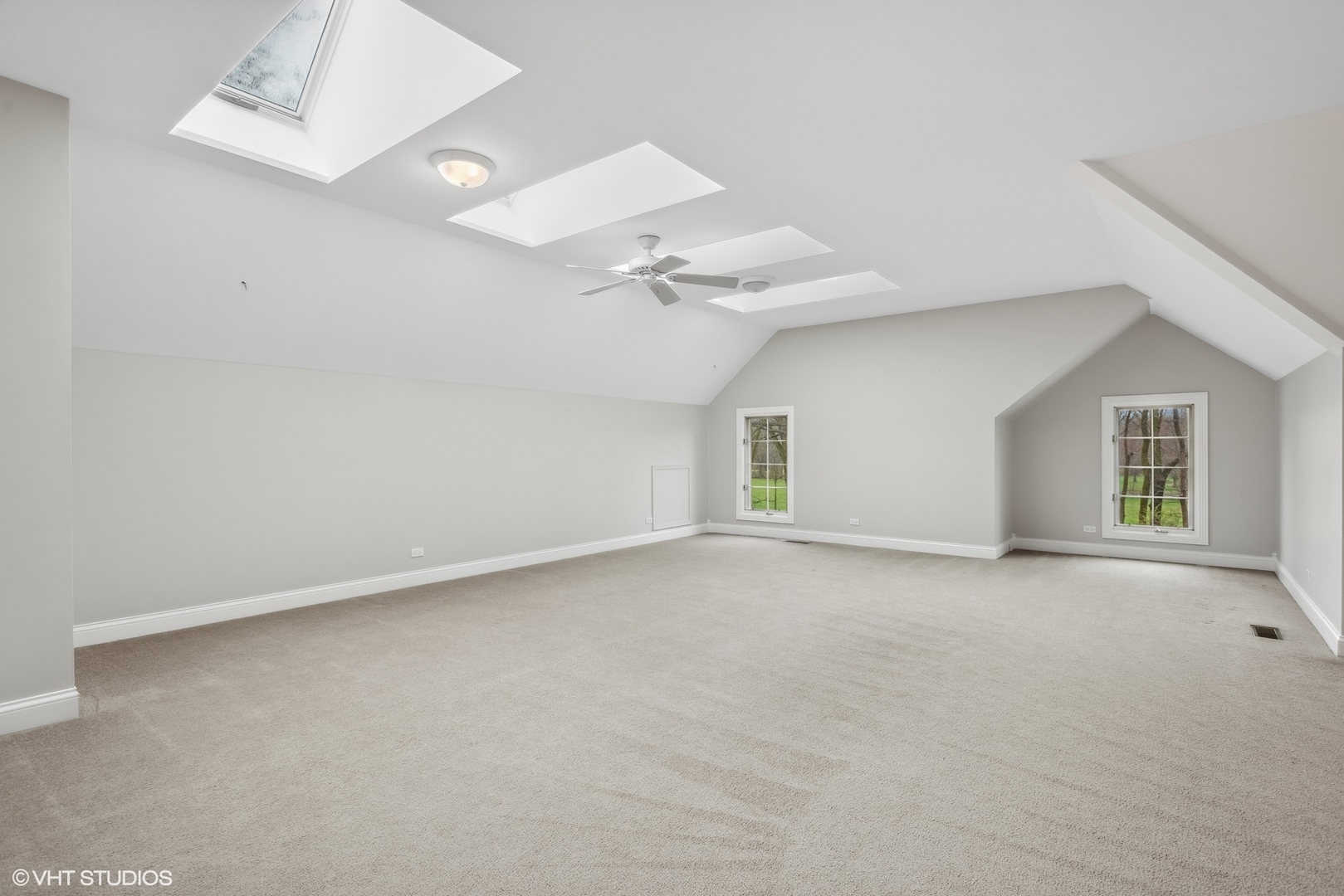 5N156 Dunham Road St. Charles, IL 60174 - Photo 54 of 65 an empty room with a ceiling fan and window