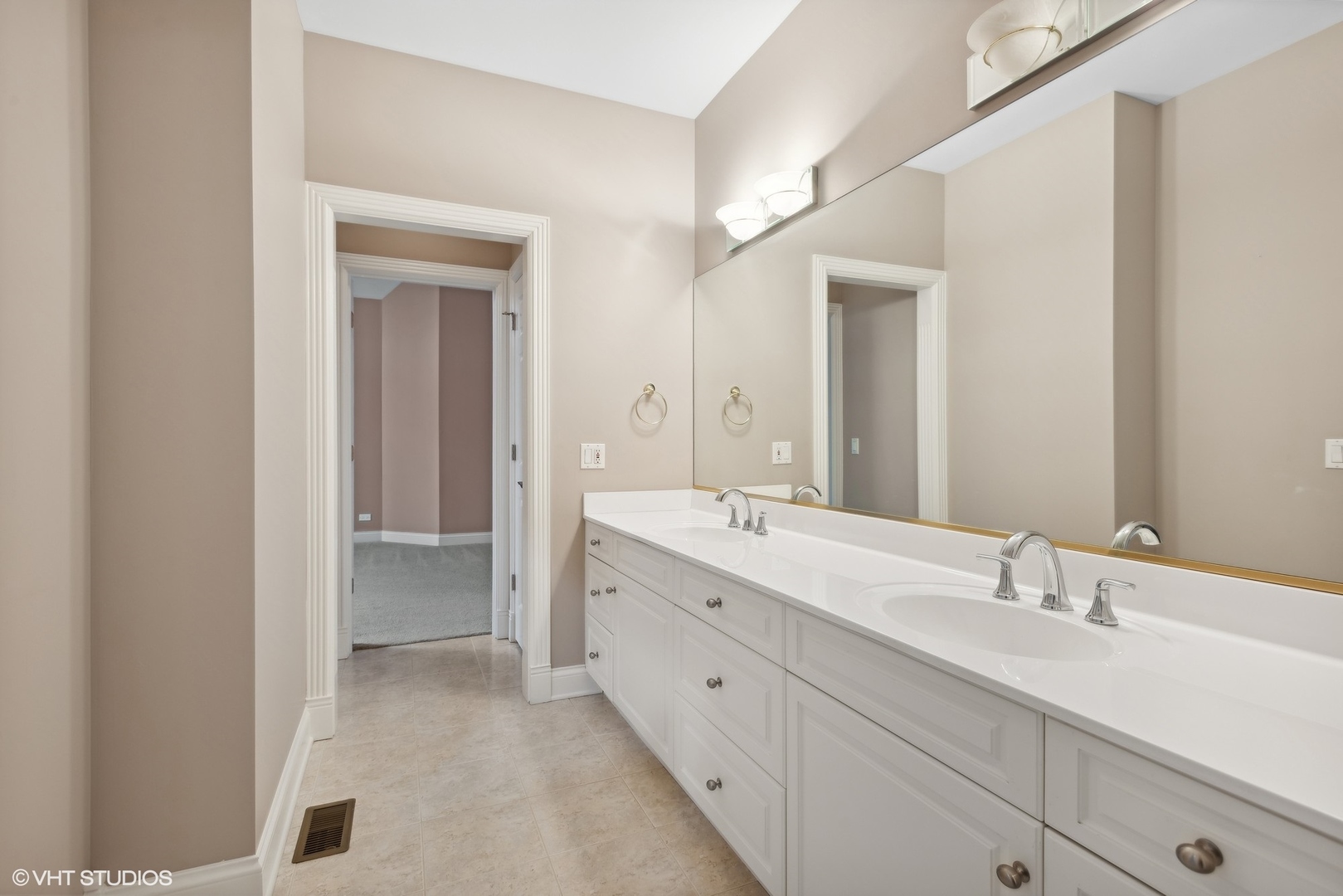 5N156 Dunham Road St. Charles, IL 60174 - Photo 57 of 65 a spacious bathroom with a double vanity sink and mirror