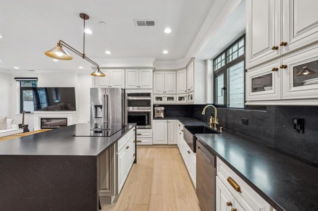 a view of a room that has a large window