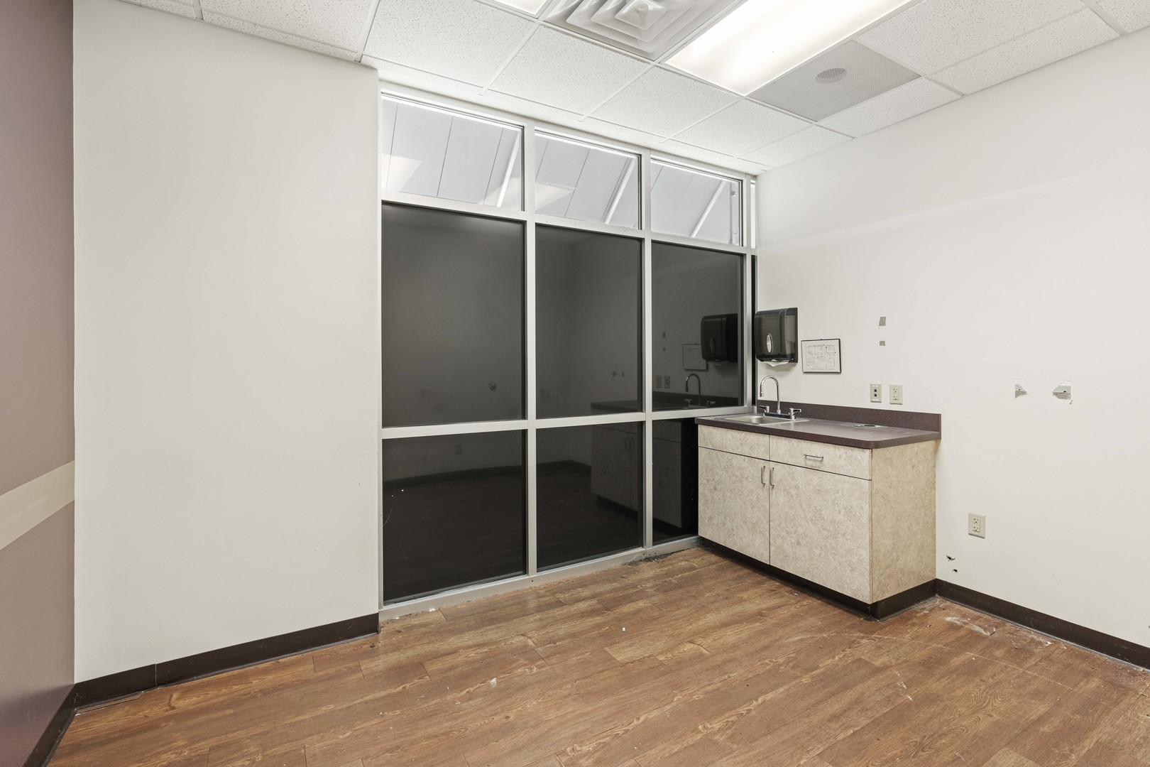2427 Ridge Road Highland, IN 46322 - Photo 11 of 32 a kitchen with a refrigerator and a sink