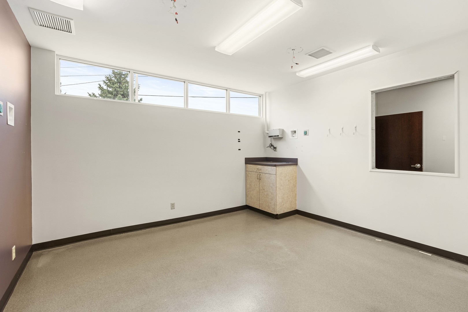 2427 Ridge Road Highland, IN 46322 - Photo 13 of 32 a view of an empty room with windows
