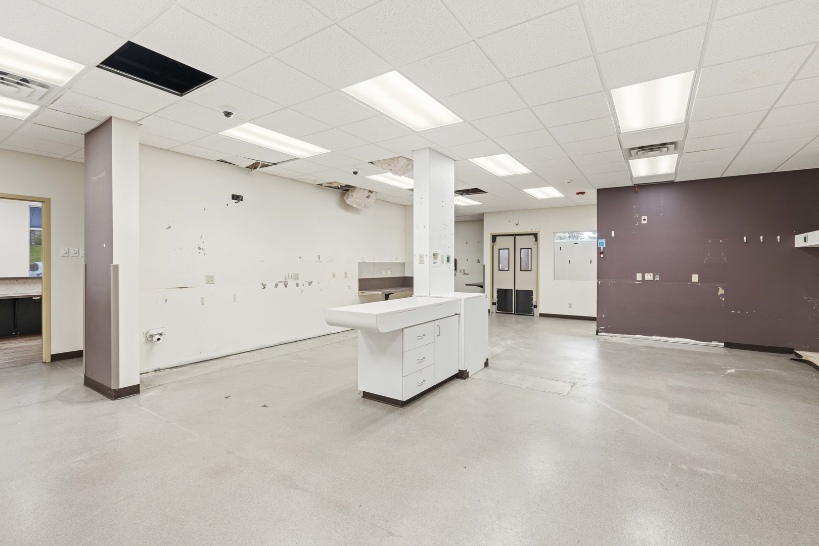 2427 Ridge Road Highland, IN 46322 - Photo 15 of 32 a large room with chandelier and a stove