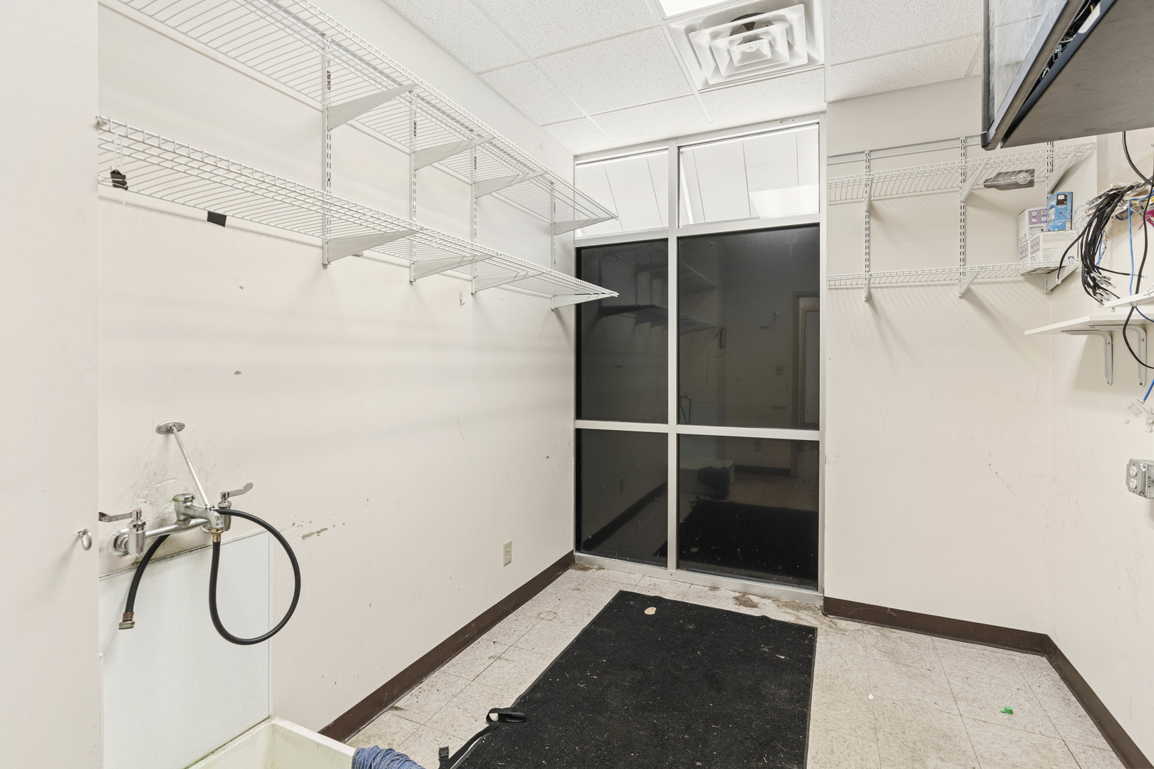 2427 Ridge Road Highland, IN 46322 - Photo 22 of 32 a view of a room with racks on the wall