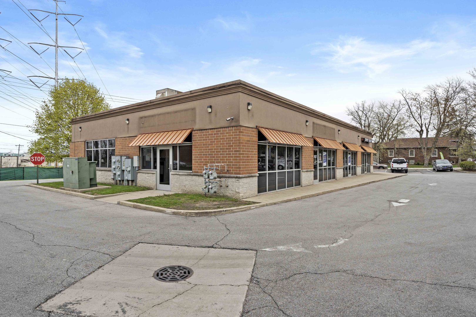 2427 Ridge Road Highland, IN 46322 - Photo 26 of 32 a city street lined with buildings and trees