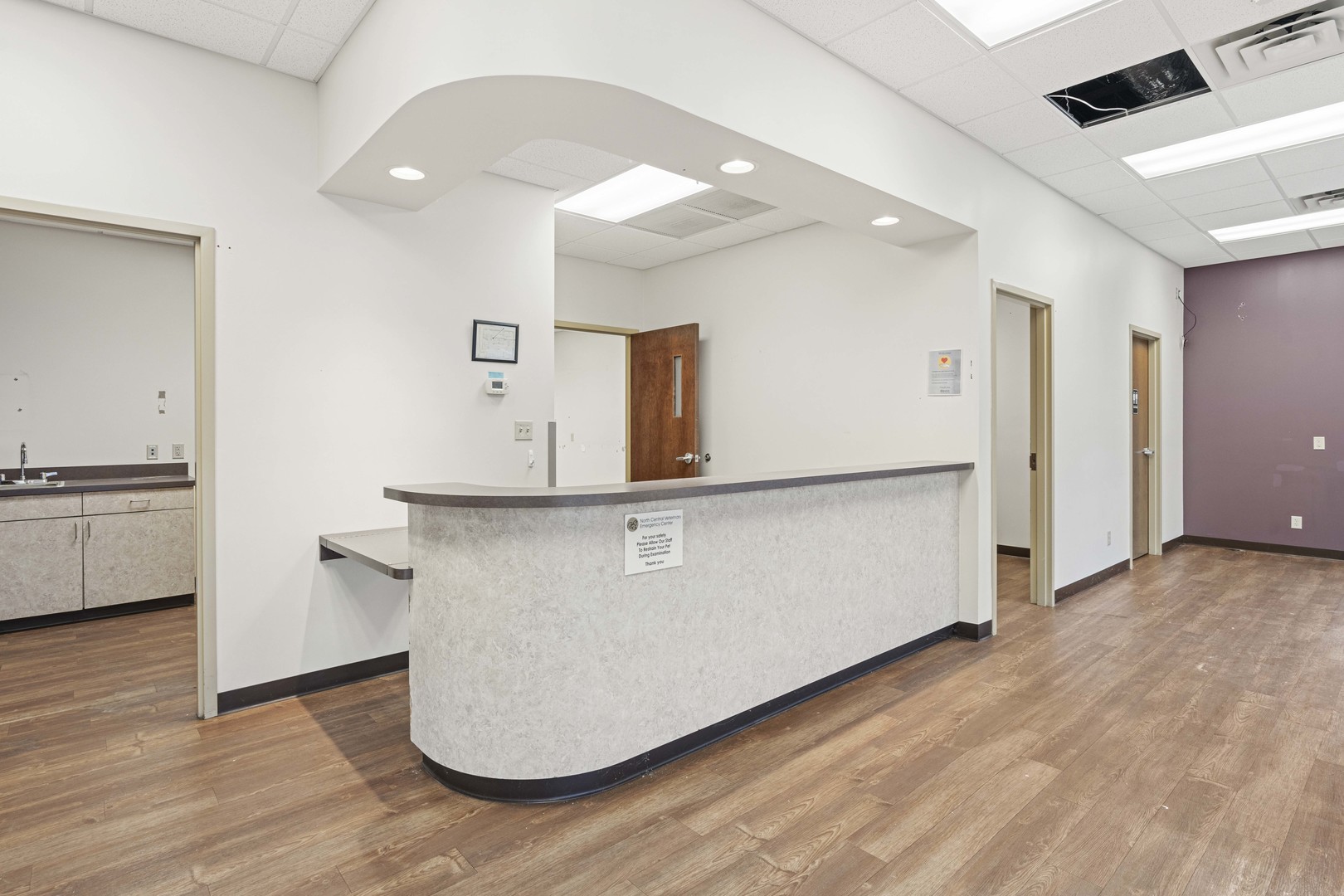 2427 Ridge Road Highland, IN 46322 - Photo 5 of 32 a room with wooden floor and white walls