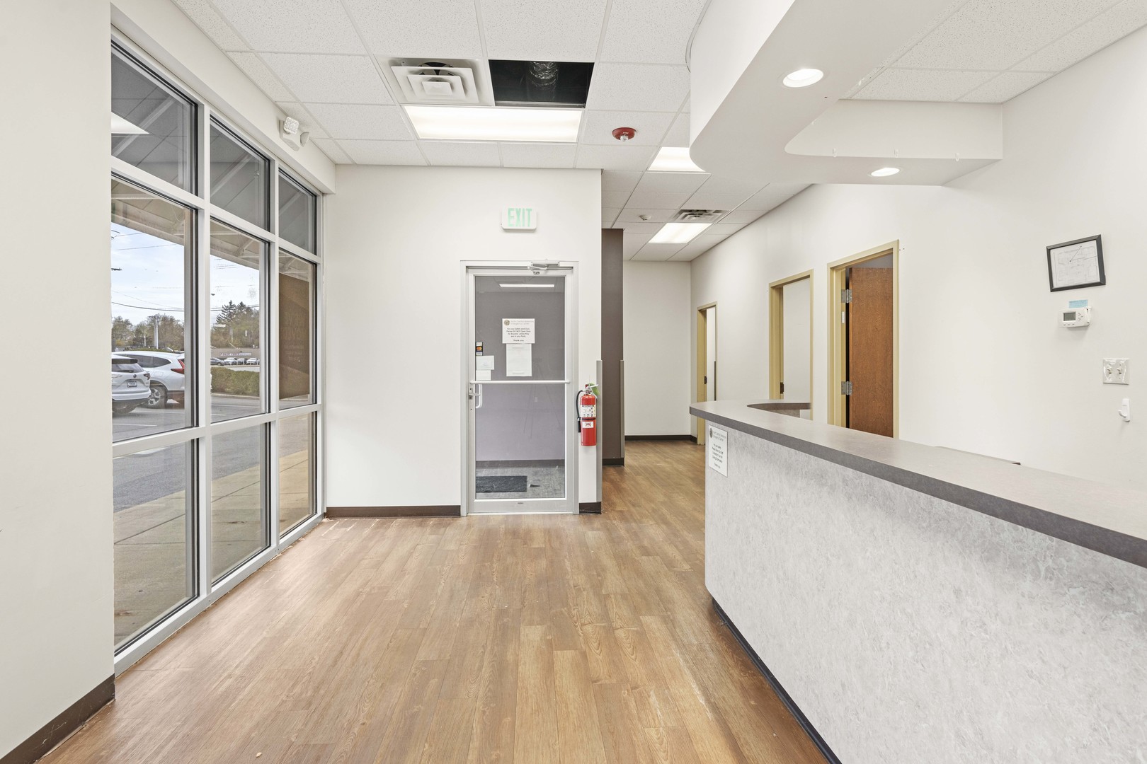 2427 Ridge Road Highland, IN 46322 - Photo 6 of 32 a view of a big room with wooden floor and windows