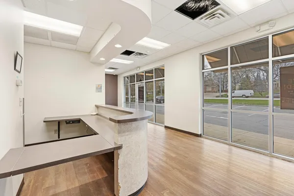 a kitchen that has a microwave and a stove