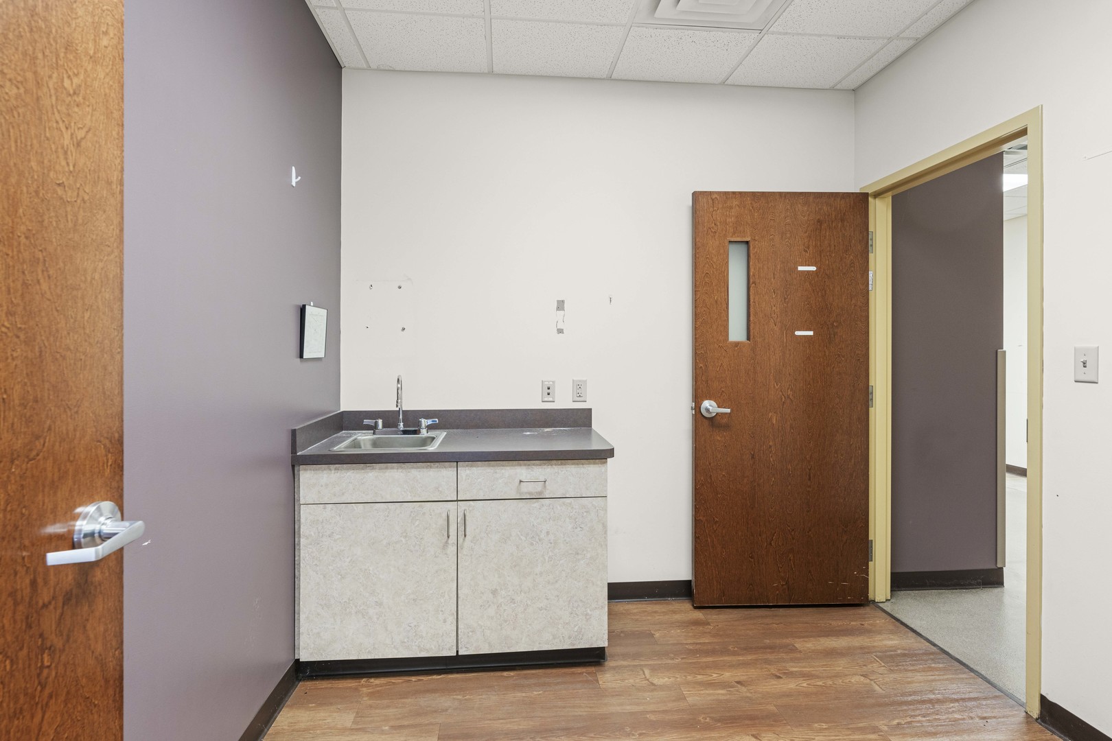2427 Ridge Road Highland, IN 46322 - Photo 9 of 32 a bathroom with a granite countertop sink and a mirror