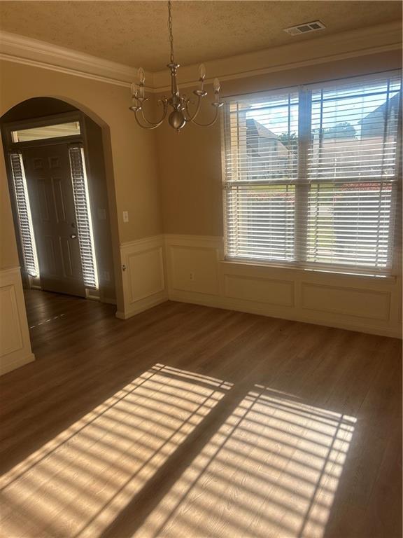 22 Pawnee Trail Fort Mitchell, AL 36856 - Photo 7 of 40 Wood-finish flooring with wainscoting and crown molding