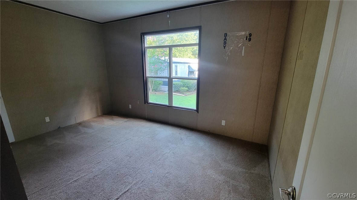 129 Locust Drive Bracey, VA 23919 - Photo 11 of 27 a view of an empty room with a window