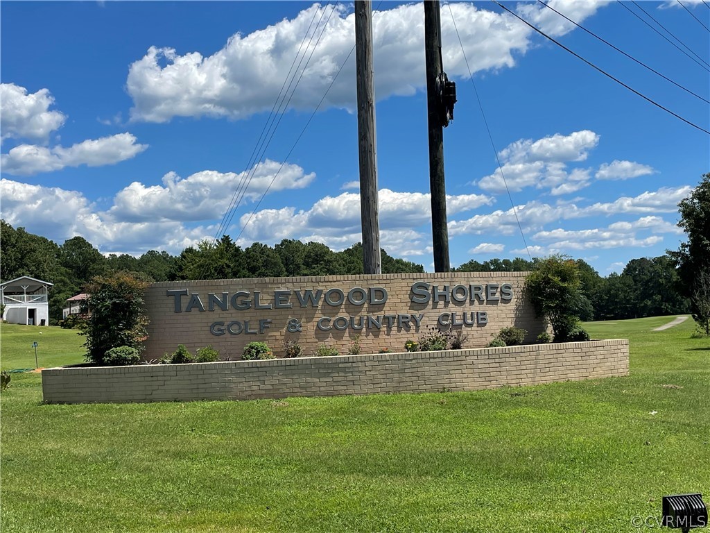 129 Locust Drive Bracey, VA 23919 - Photo 22 of 27 a view of a sign board with a big yard