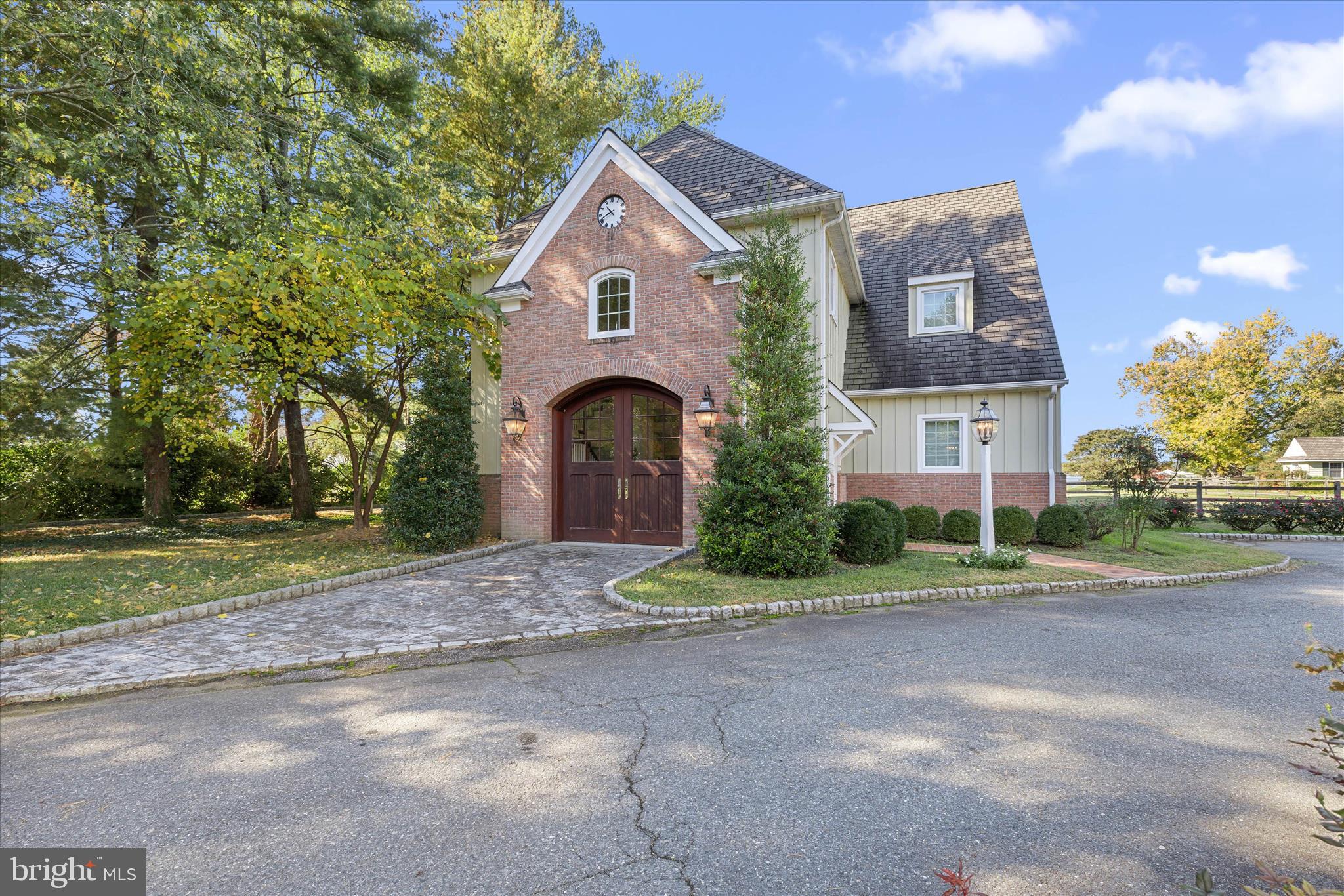 27473 Westpoint Road Easton, MD 21601 - Photo 35 of 58 a front view of a house with a yard and garage