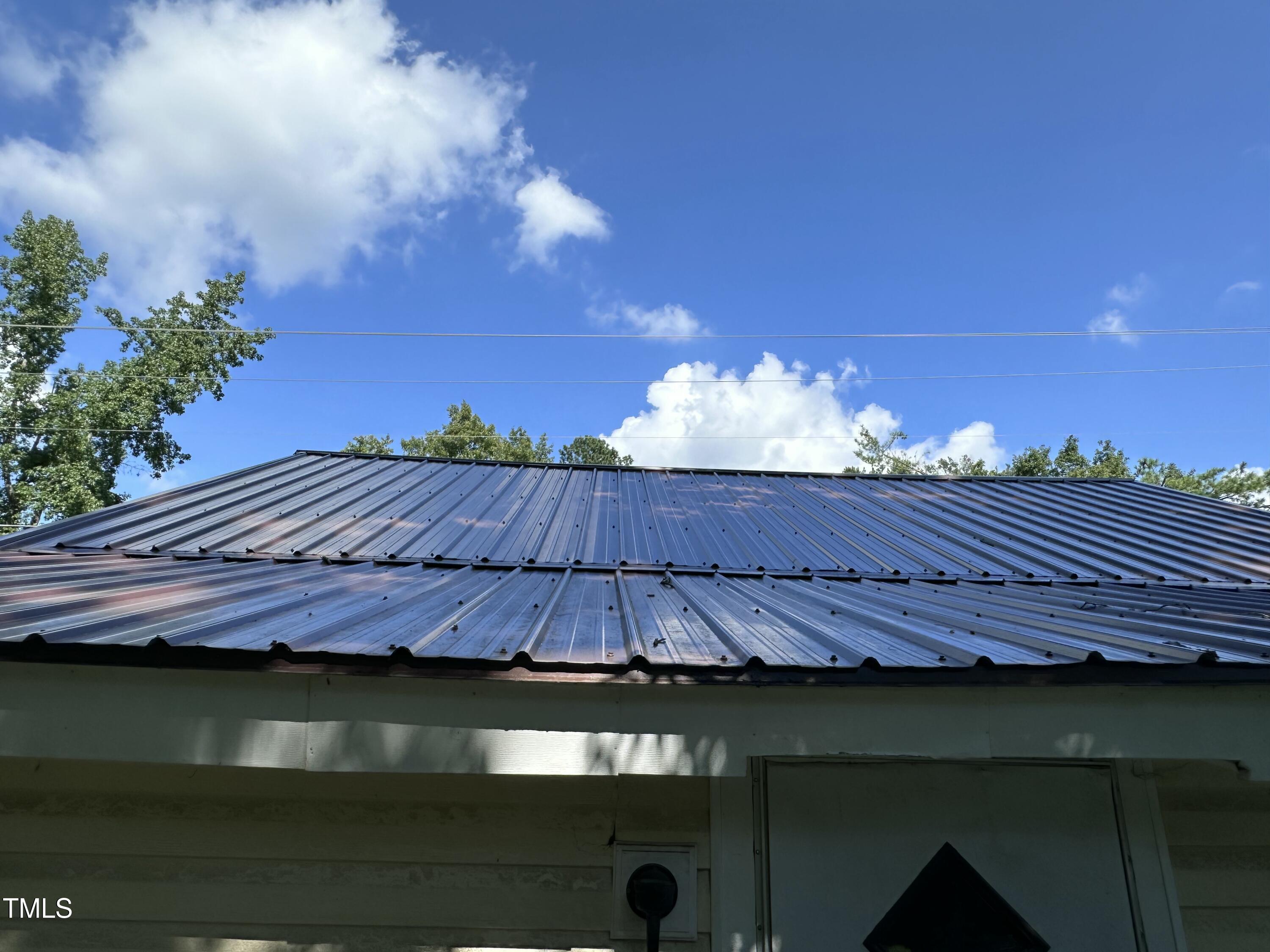 129 Spring Valley Road Henderson, NC 27536 - Photo 7 of 14 a view of swimming pool with outdoor space and sitting area