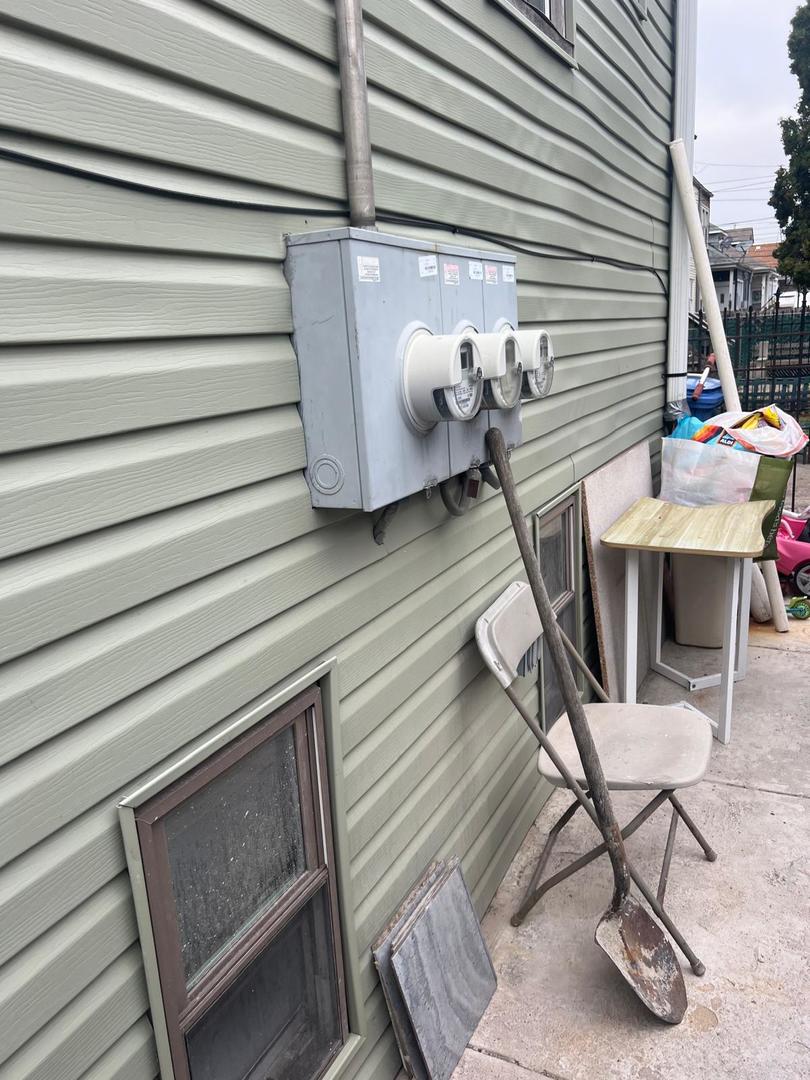6155 South Whipple Street Chicago, IL 60629 - Photo 15 of 18 a view of entryway and hall with wooden floor
