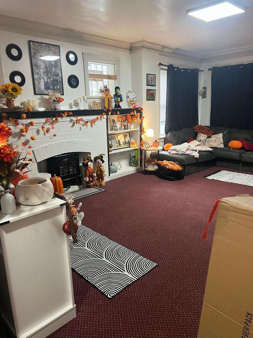 6155 South Whipple Street Chicago, IL 60629 - Photo 2 of 18 a view of a room with furniture and toys