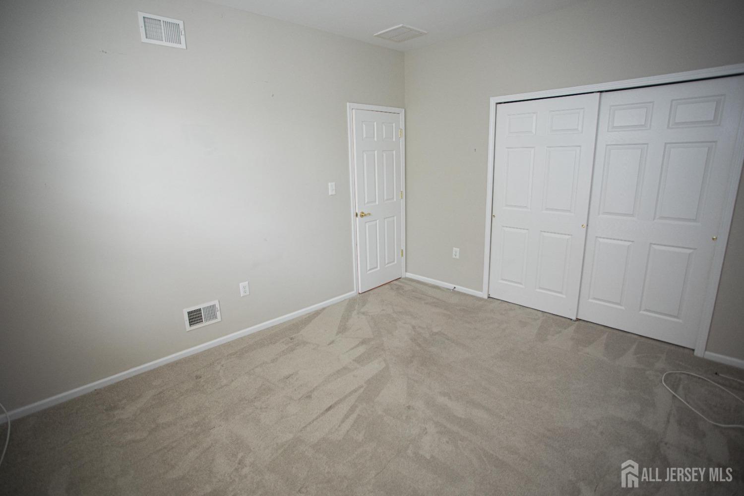 247 Spring Meadow Way Monroe Township, NJ 08831 - Photo 21 of 32 a view of an empty room