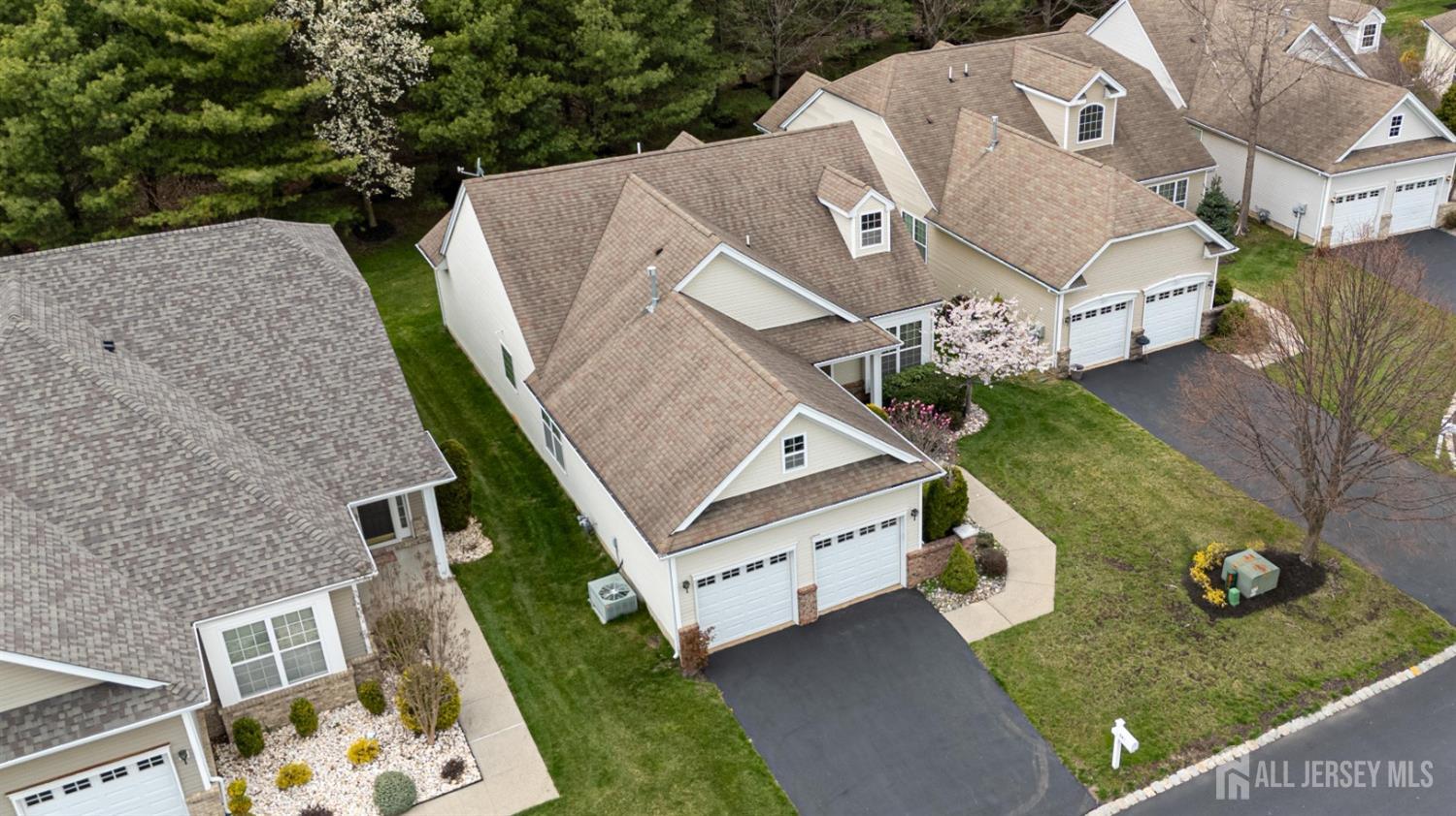 247 Spring Meadow Way Monroe Township, NJ 08831 - Photo 29 of 32 an aerial view of a house with a yard