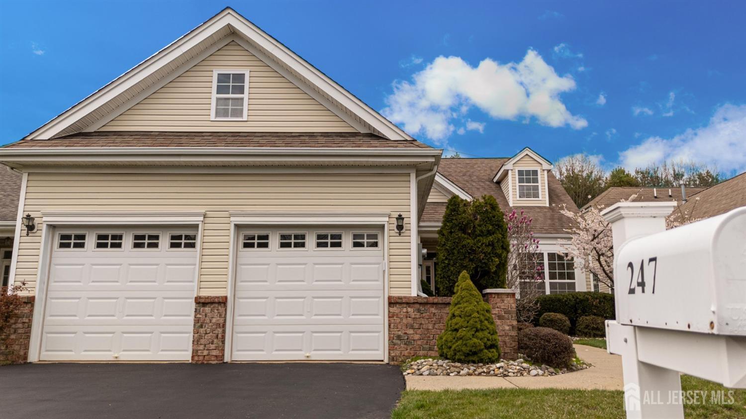 247 Spring Meadow Way Monroe Township, NJ 08831 - Photo 3 of 32 a view of a house with a yard