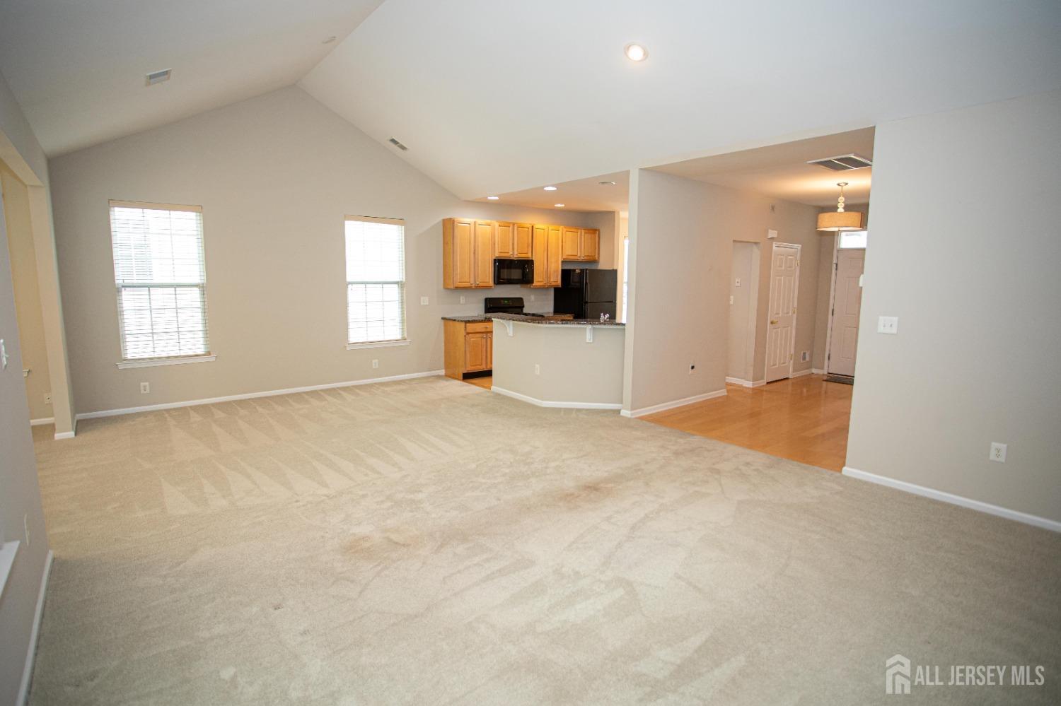 247 Spring Meadow Way Monroe Township, NJ 08831 - Photo 9 of 32 a view of a kitchen with a sink and a window