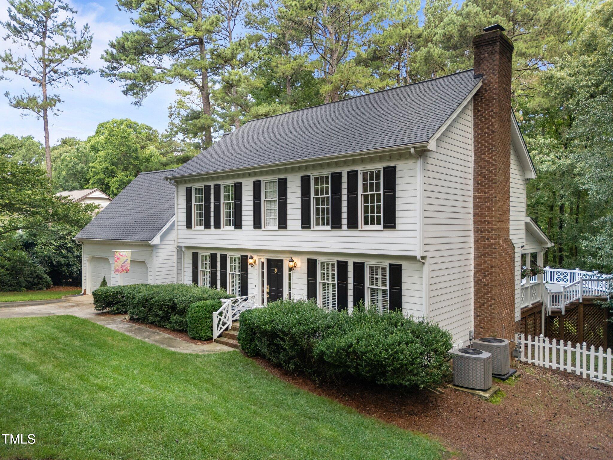 8909 Wellsley Way Raleigh, NC 27613 - Photo 2 of 47 3-web-or-mls-DJI_20250617104719_0970_D