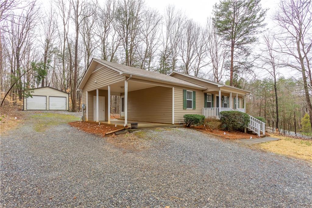 7325 Goodwill Church Road Oak Ridge, NC 27310 - Photo 3 of 20 Single carport and wired detached 2 car garage/workshop