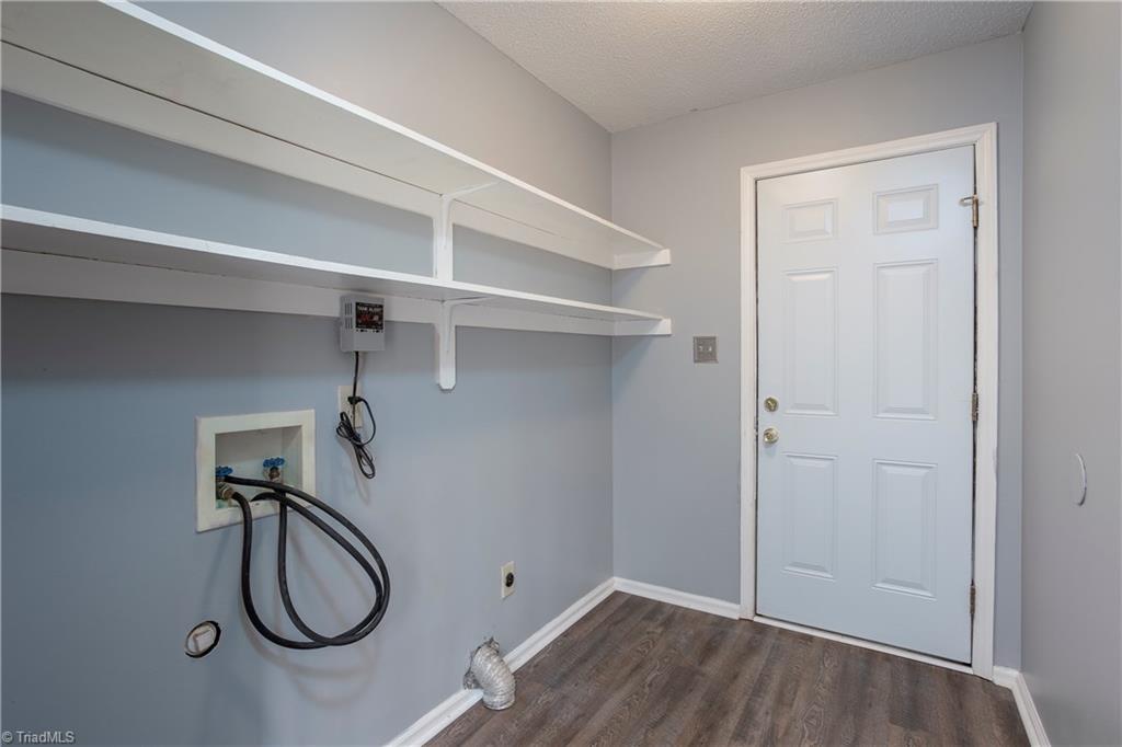 7325 Goodwill Church Road Oak Ridge, NC 27310 - Photo 9 of 20 Laundry Room leading out onto the carport