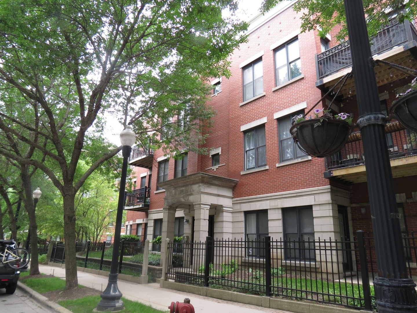 1500 South Halsted Street, Unit 3B Chicago, IL 60607 - Photo 1 of 33 a view of a brick building next to a yard