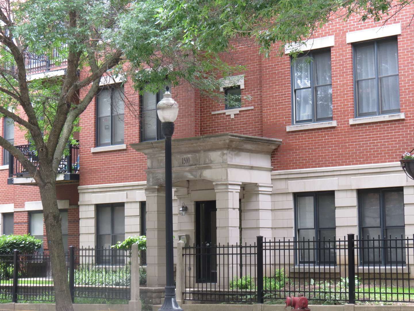 1500 South Halsted Street, Unit 3B Chicago, IL 60607 - Photo 2 of 33 a front view of a house with a porch