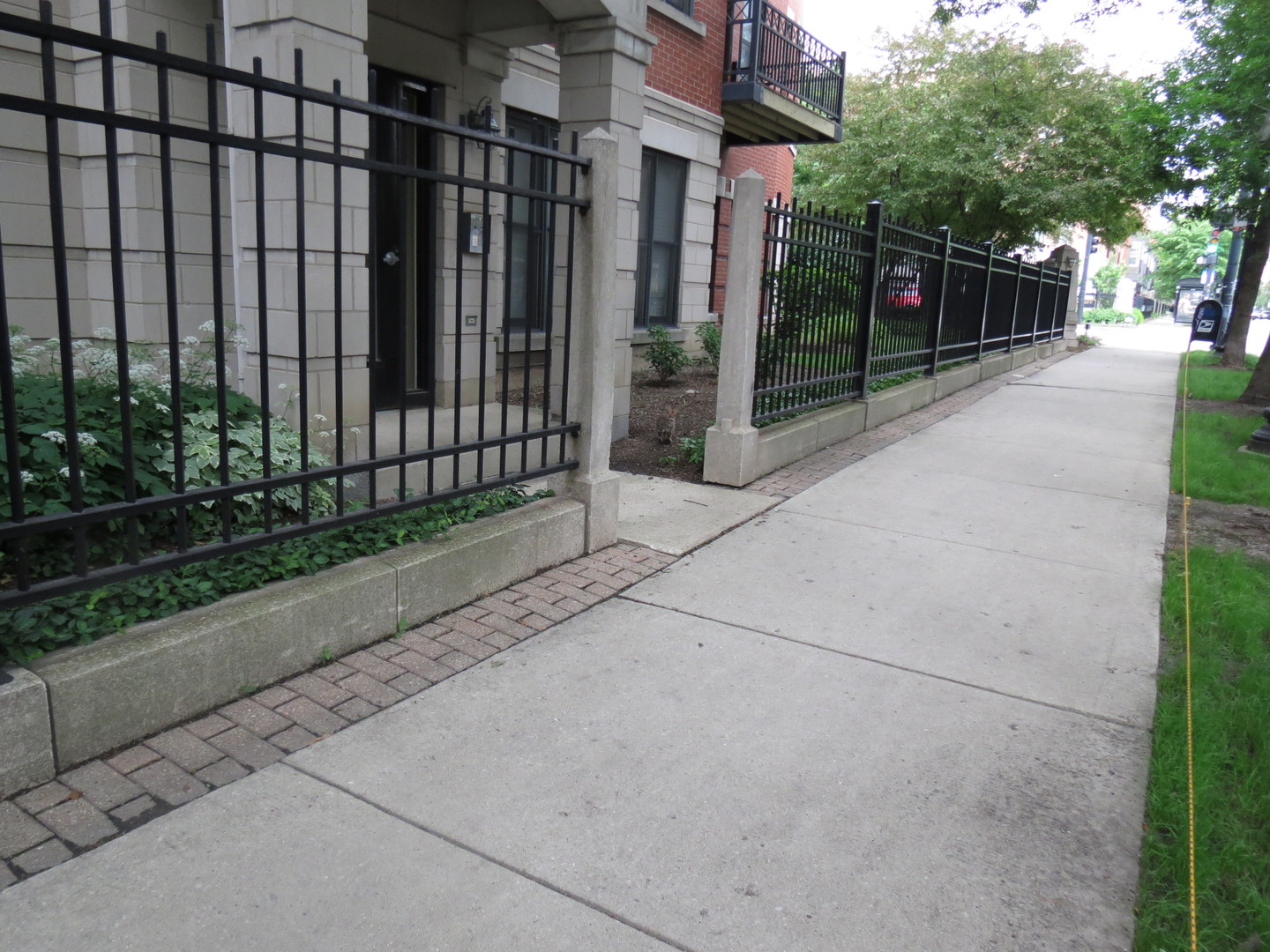 1500 South Halsted Street, Unit 3B Chicago, IL 60607 - Photo 32 of 33 a view of a backyard with brick wall