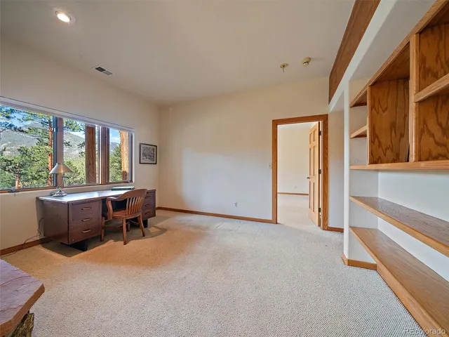 a view of a livingroom with furniture window and outside view