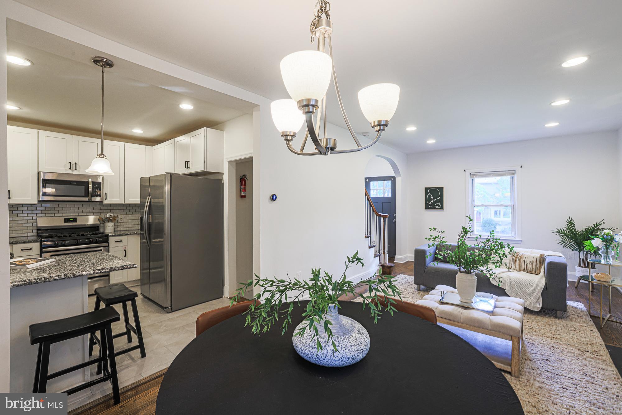 410 Kingston Road Baltimore, MD 21229 - Photo 9 of 56 Dining looking into living and kitchen