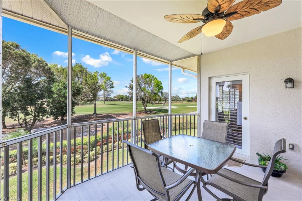 a view of a two chairs in the balcony