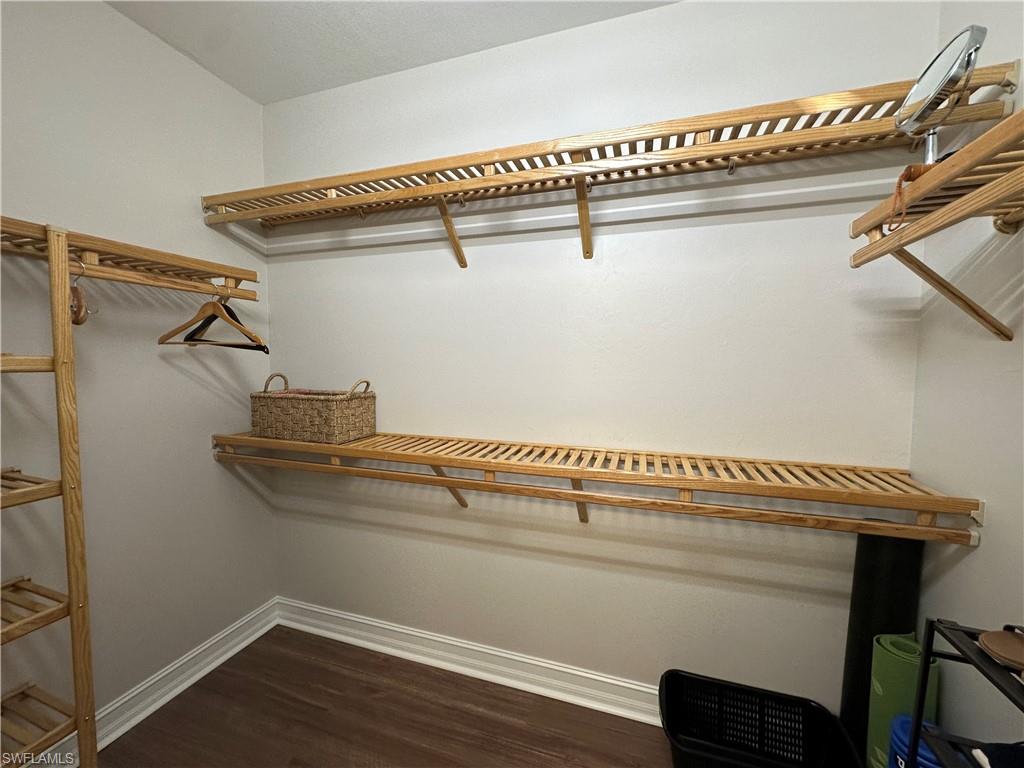 9113 Michael Circle, Unit 7710 Naples, FL 34113 - Photo 17 of 34 a view of a room with racks on the wall