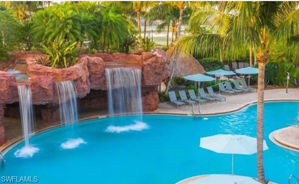 9113 Michael Circle, Unit 7710 Naples, FL 34113 - Photo 26 of 34 a view of an outdoor space and porch