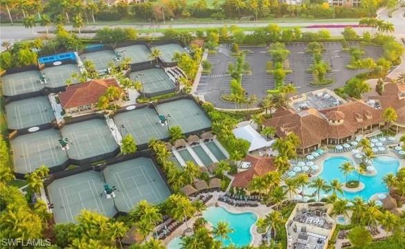 9113 Michael Circle, Unit 7710 Naples, FL 34113 - Photo 27 of 34 an aerial view of residential houses with outdoor space