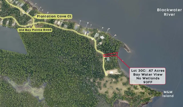 a sign that is on a brick wall