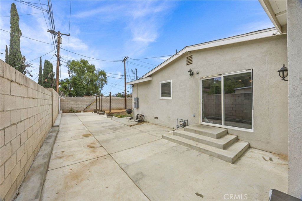 10028 Primrose Drive Riverside, CA 92503 - Photo 19 of 19 a view of a house with backyard and sitting area