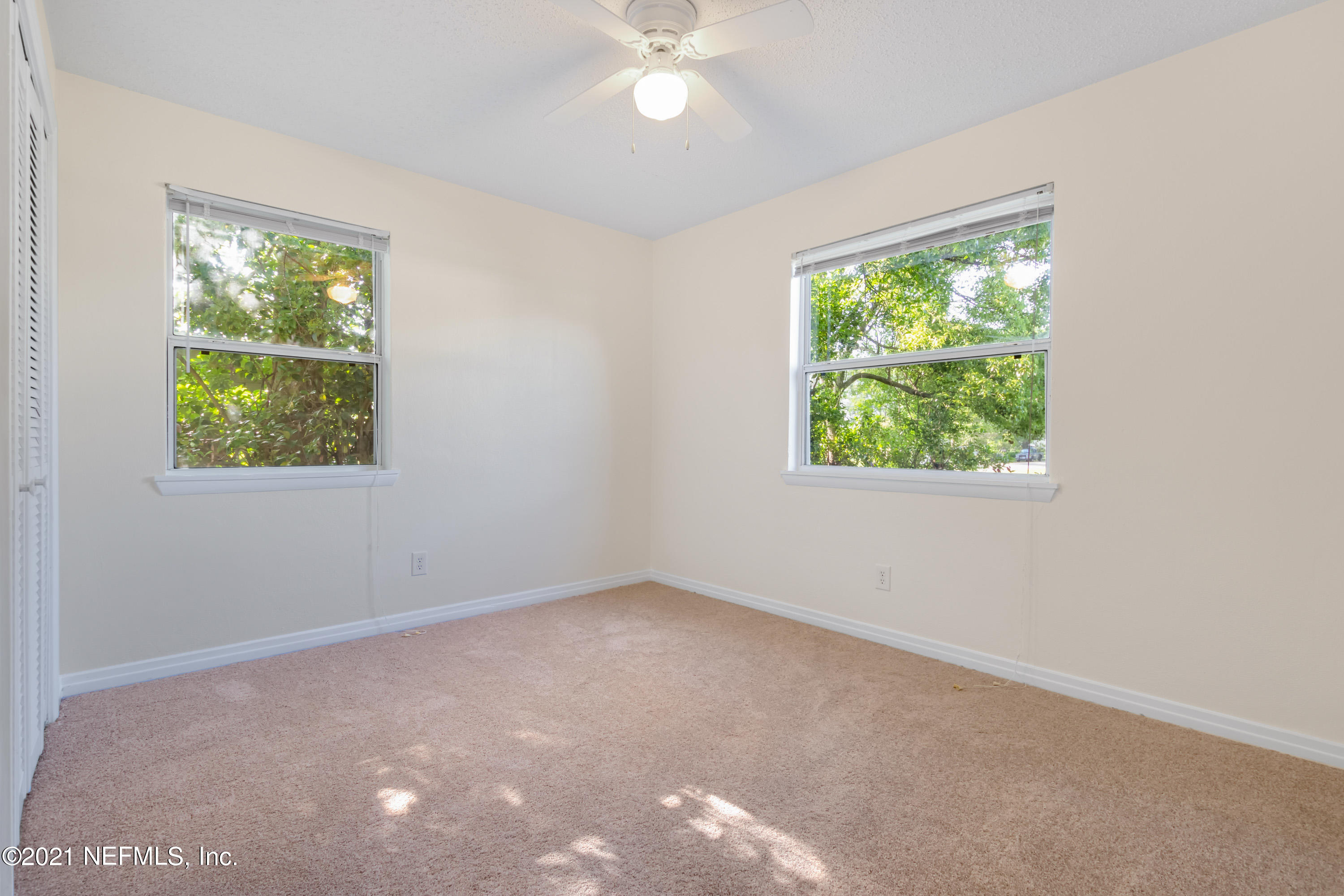 6554 Aires Road Jacksonville, FL 32244 - Photo 19 of 29 an empty room with a window