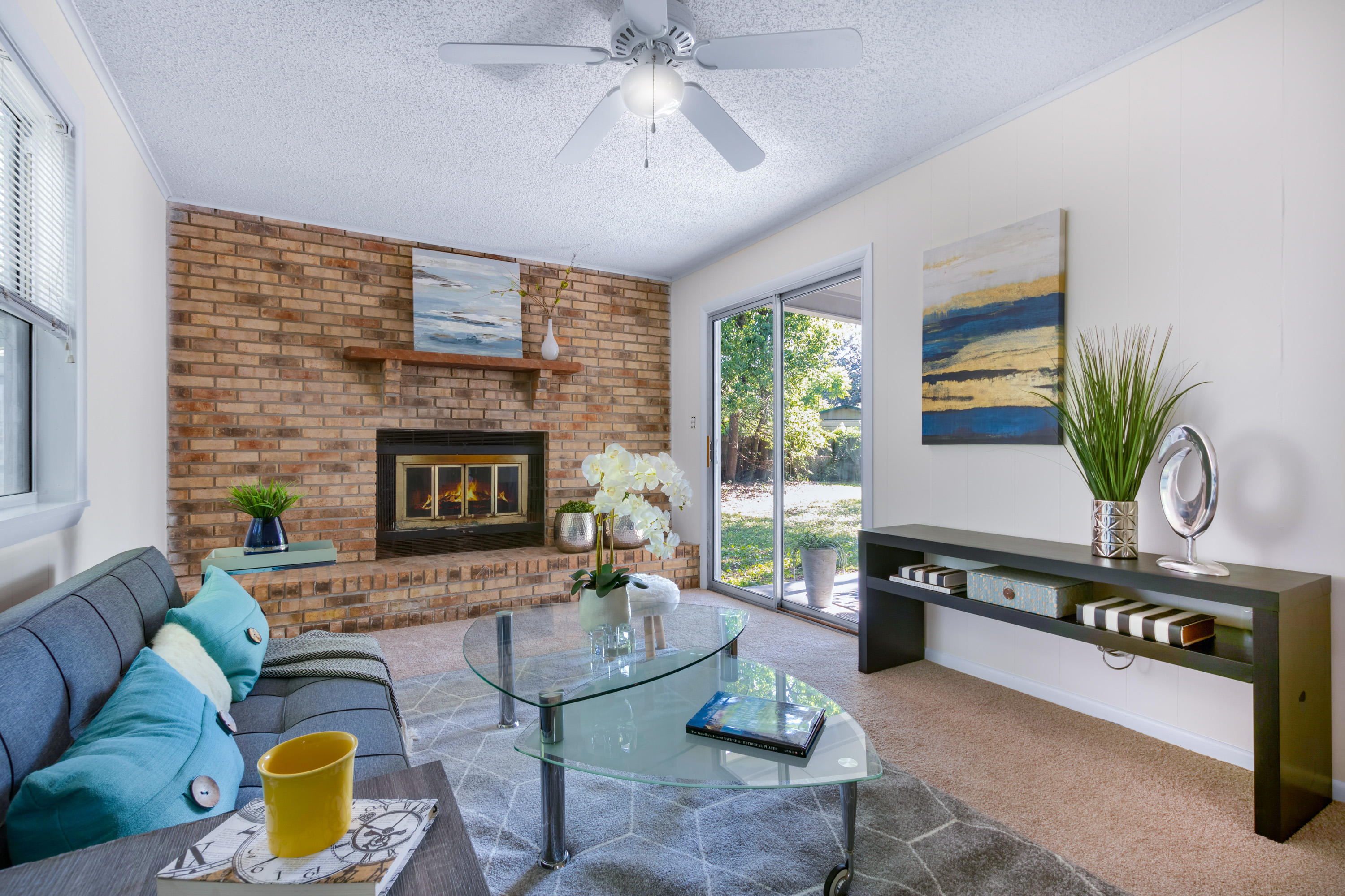6554 Aires Road Jacksonville, FL 32244 - Photo 4 of 29 a living room with furniture and a fireplace
